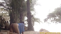Naturist woman on the beach enjoy beiing naked